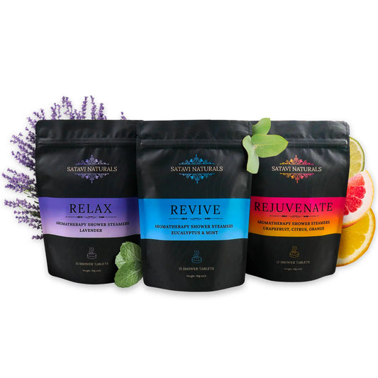 Three black packages of Satavi Naturals shower steamers labeled 'Relax', 'Revive', and 'Rejuvenate' on a white background.