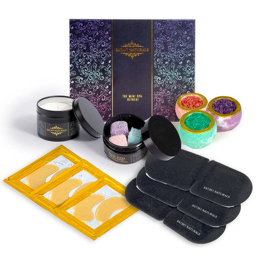 Mini Spa Retreat Gift Set with sugar scrubs, candle, bath bombs, steam masks, and eye masks.
