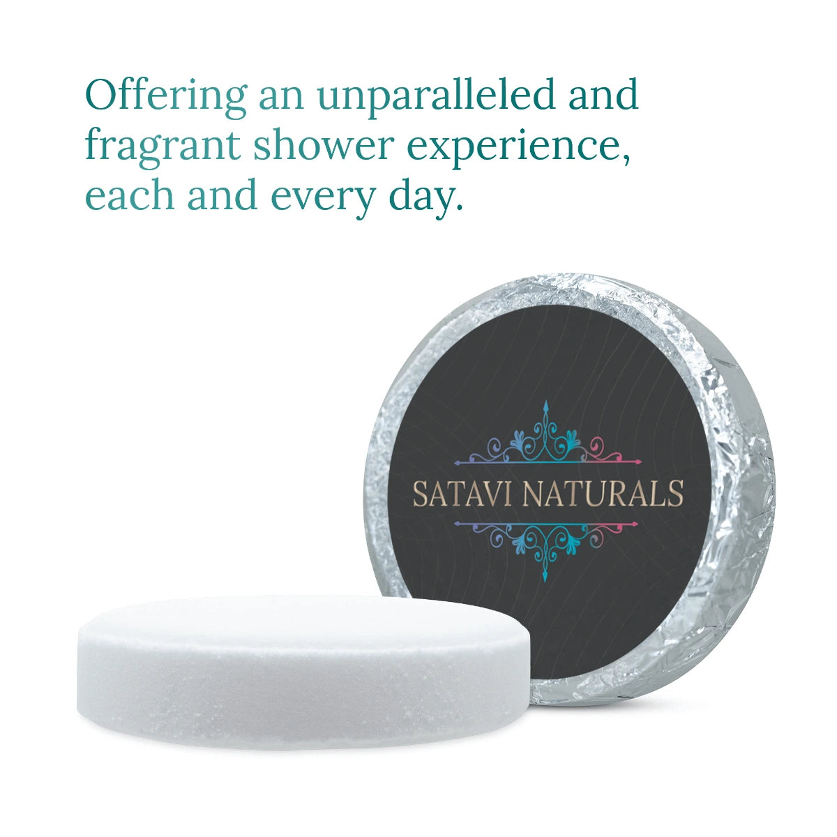 Unwrapped Satavi Naturals premium shower steamer tablet with foil packaging.